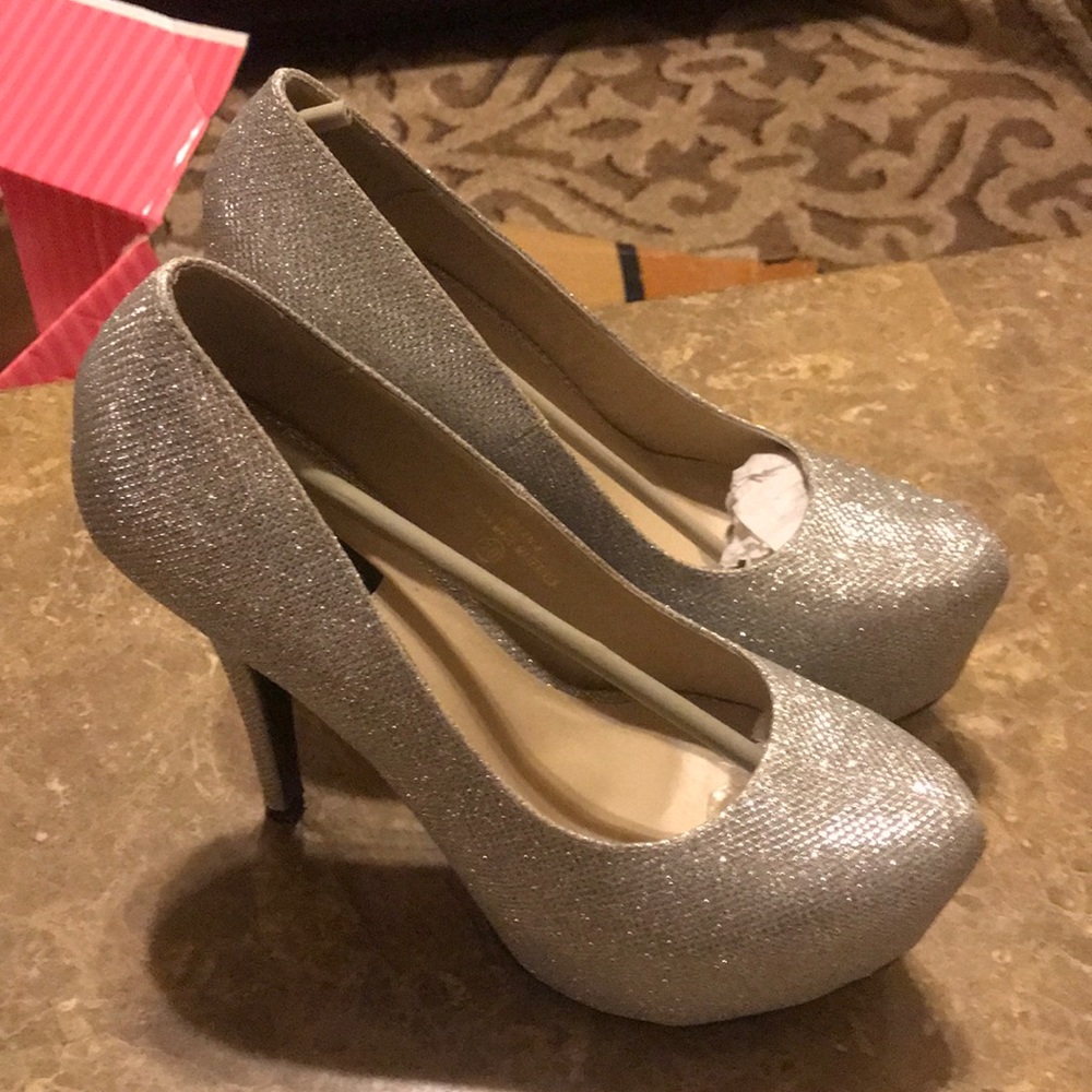 Glitzy silver pumps